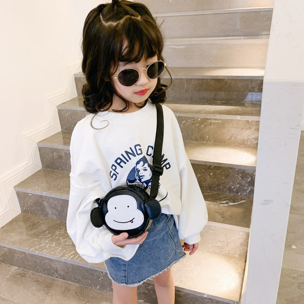 Dječja moderna mala okrugla torba s dugom ručkom