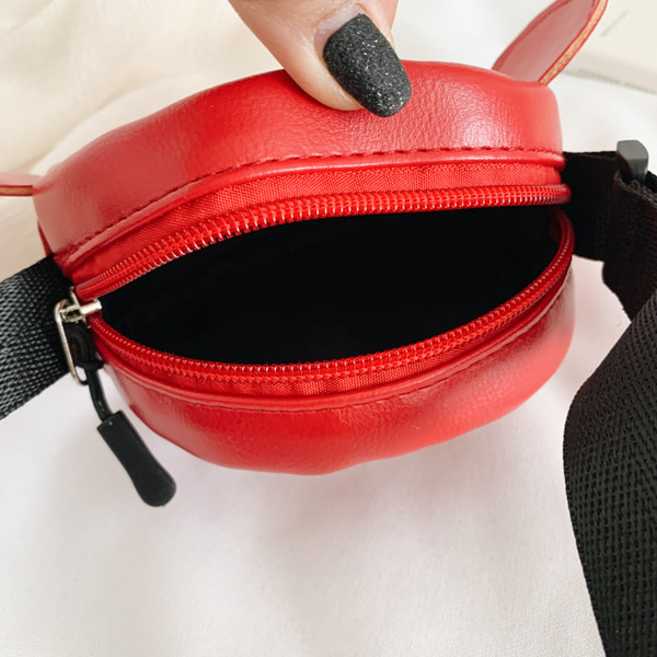 Dječja moderna mala okrugla torba s dugom ručkom