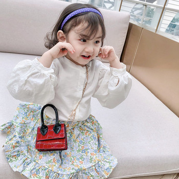 Κομψή παιδική τσάντα με μεταλλικό απλό μοντέλο