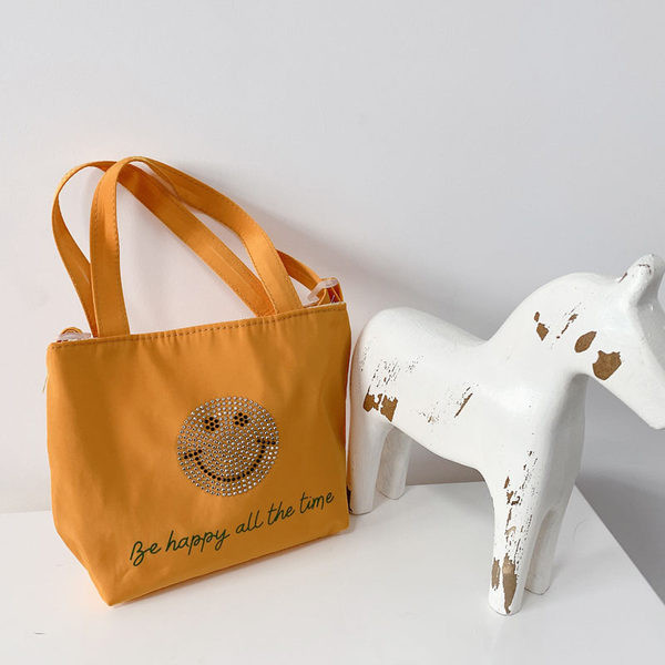 Laste igapäevane dekoratiivkivide ja kirjaga kott