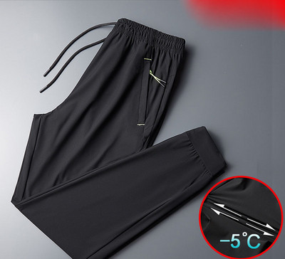 Meeste spordipüksid lipsude ja taskutega