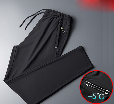 Meeste spordipüksid lipsude ja taskutega