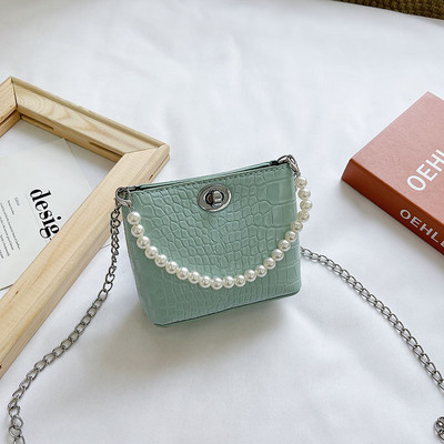 Stiilne kahe sanga ja dekoratiivpärlitega lastekott