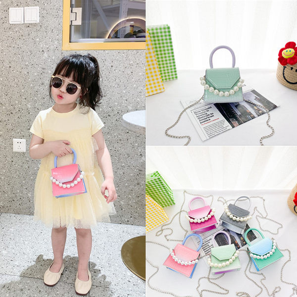 Dječja mini torbica s ukrasnim perlama i dvije ručke