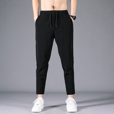 Vabaaja taskutega meeste püksid