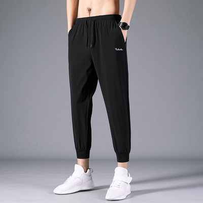 Vabaaja taskutega meeste püksid