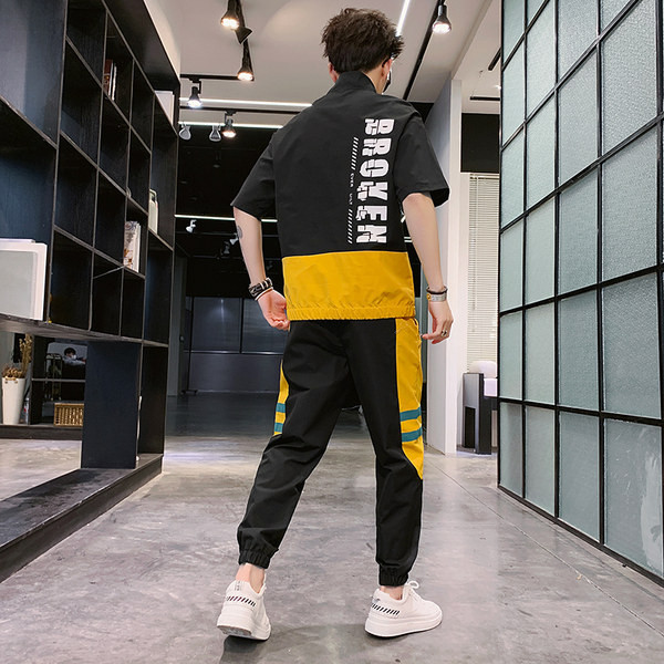 Jauna modeļa vīriešu komplekts no divu daļu biksēm un blūzes