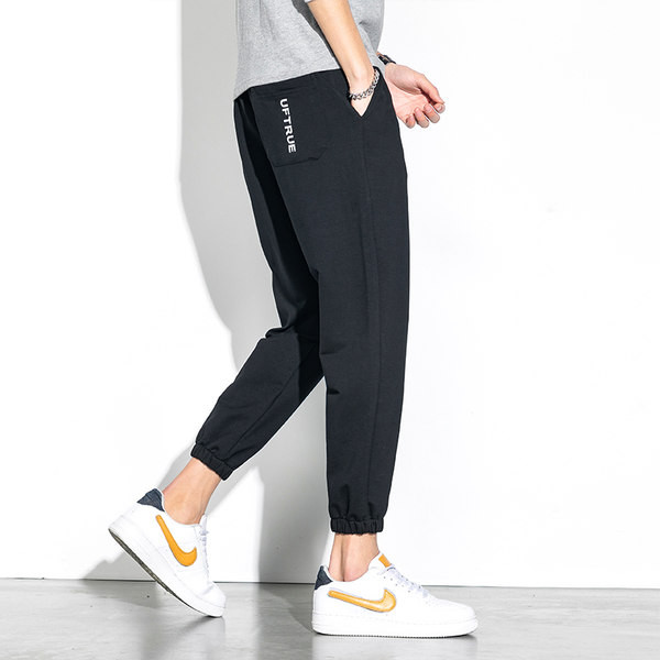 Meeste vabaaja püksid kirjadega