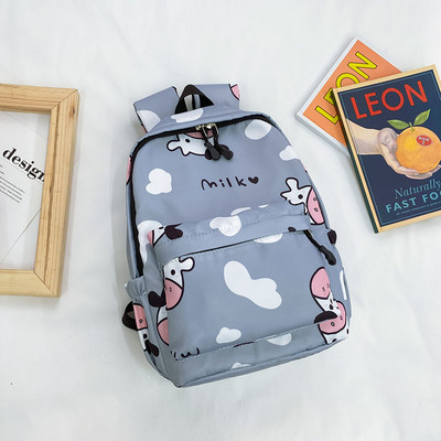 Moodne mustri ja taskuga laste seljakott