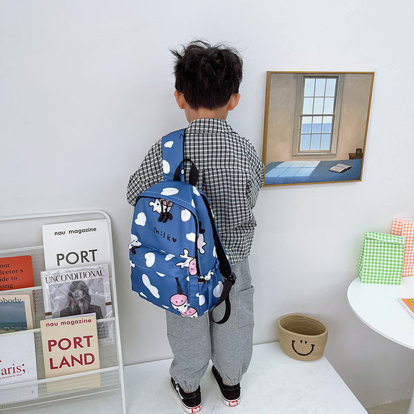 Moodne mustri ja taskuga laste seljakott