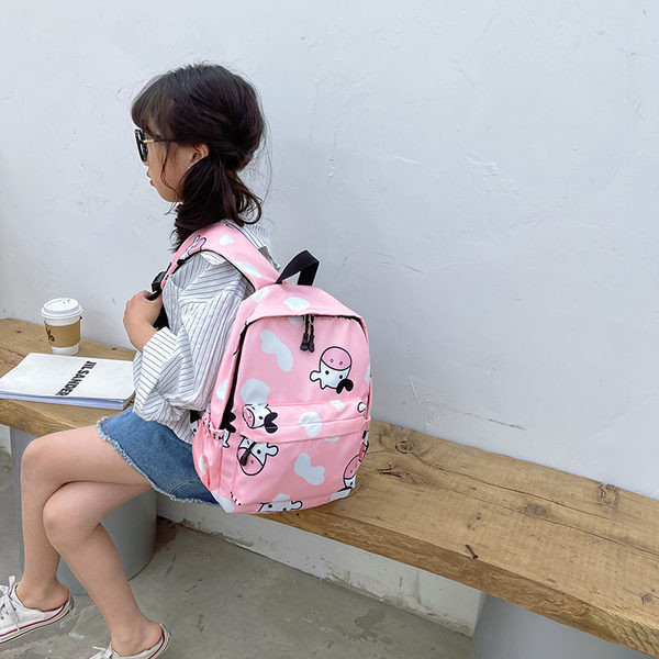 Moodne mustri ja taskuga laste seljakott