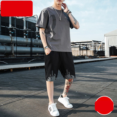 Muški dvodijelni sportski tim s aplikacijama