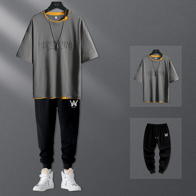 Uue mudeli meeste komplekt kahest osast - püksid ja T-särk