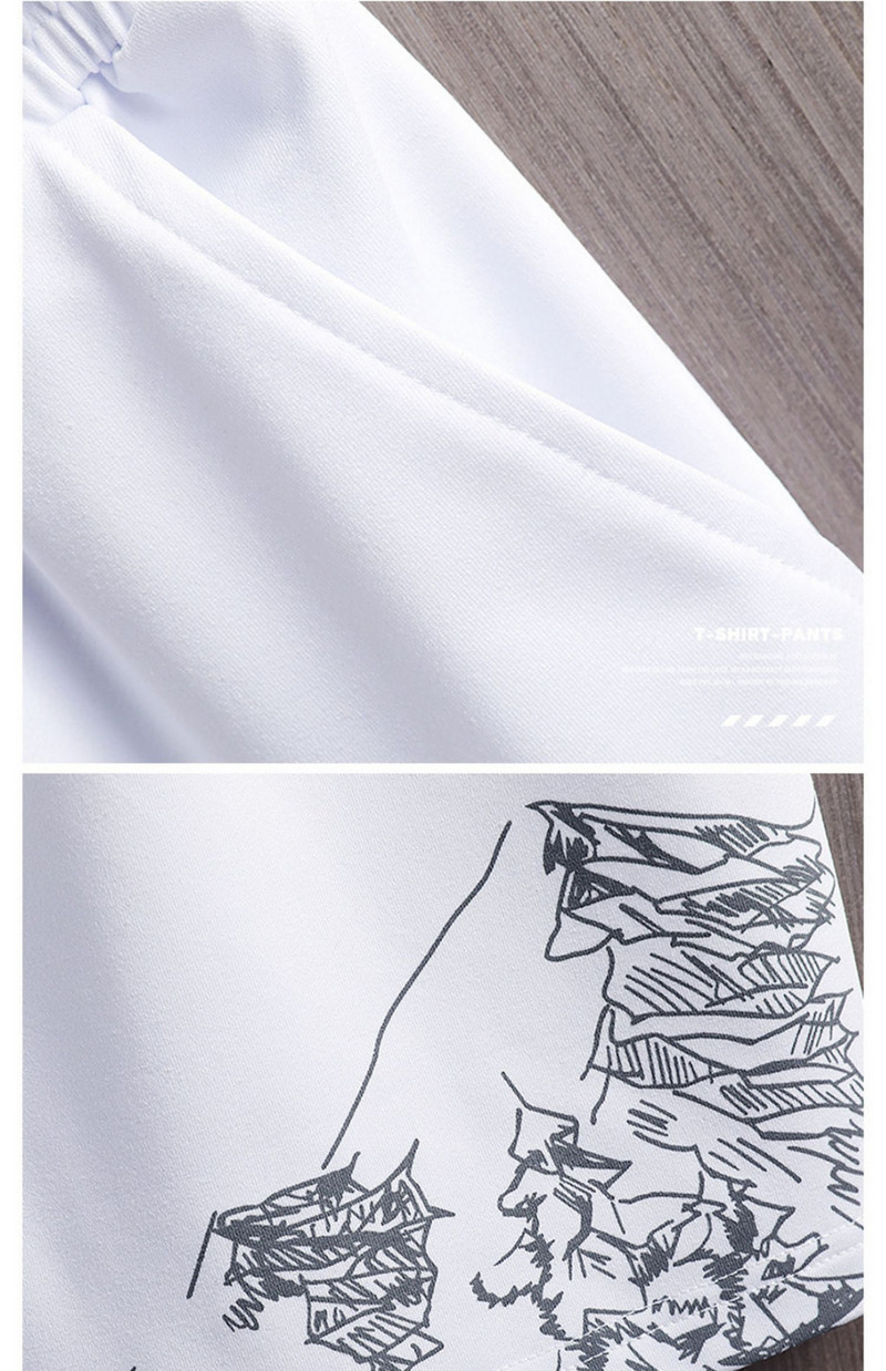 Sportska muška ekipa iz dva dijela u bijeloj i crnoj boji