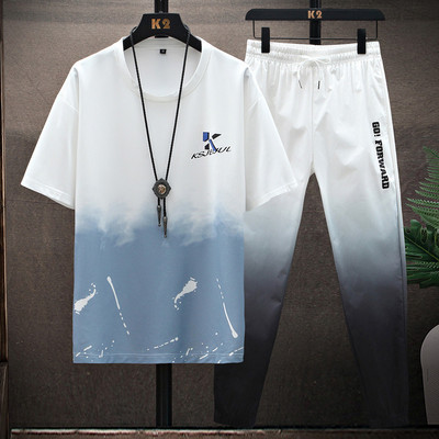 Meeste spordimeeskond kaheosalised püksid ja ovaalse kaelusega T-särk