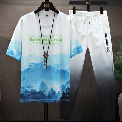 Meeste spordimeeskond kaheosalised püksid ja ovaalse kaelusega T-särk