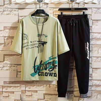 Lühikeste varrukate ja aplikatsiooniga meeste spordimeeskond