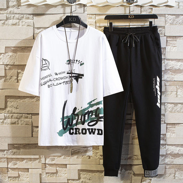 Lühikeste varrukate ja aplikatsiooniga meeste spordimeeskond