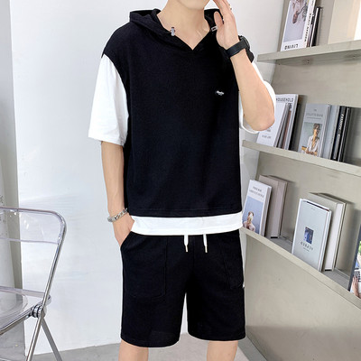 Kaheosalise kapuutsiga meeste vabaaja meeskond