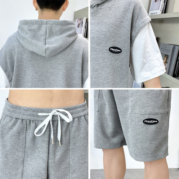 Kaheosalise kapuutsiga meeste vabaaja meeskond