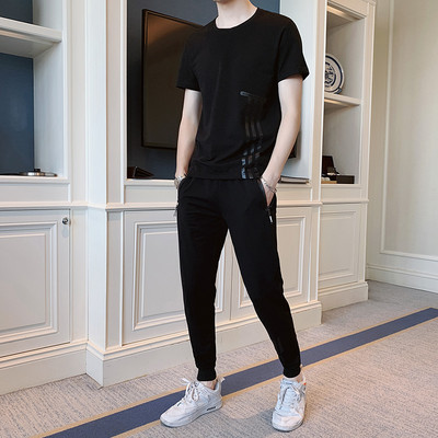 Meeste sport- ja vabaajameeskond T-särgist ja pikkadest pükstest