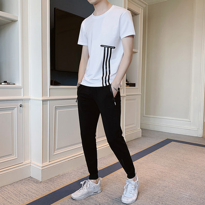 Meeste sport- ja vabaajameeskond T-särgist ja pikkadest pükstest