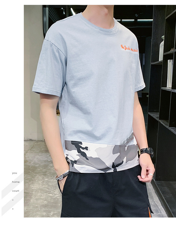 Vīriešu sporta komanda divās daļās - T-krekls un šorti