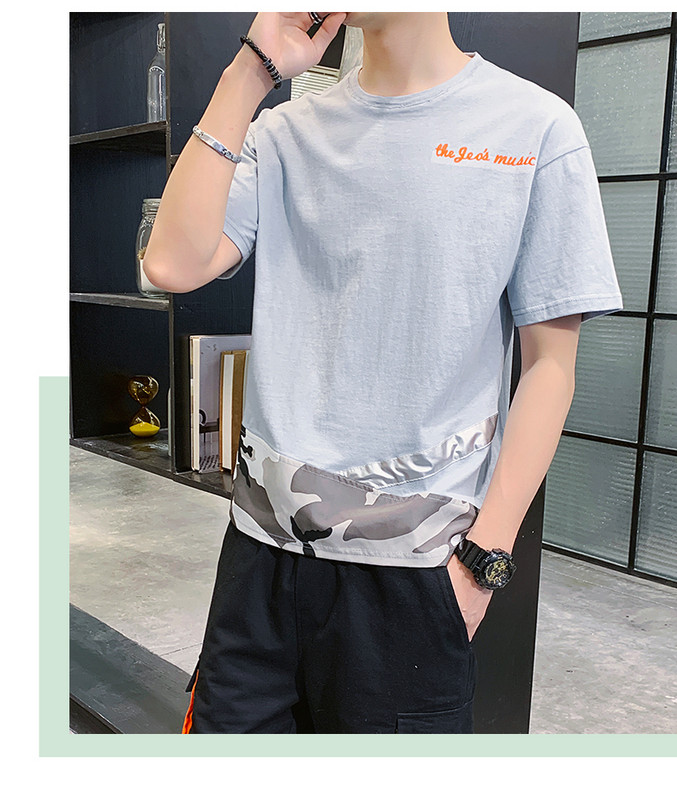 Vīriešu sporta komanda divās daļās - T-krekls un šorti