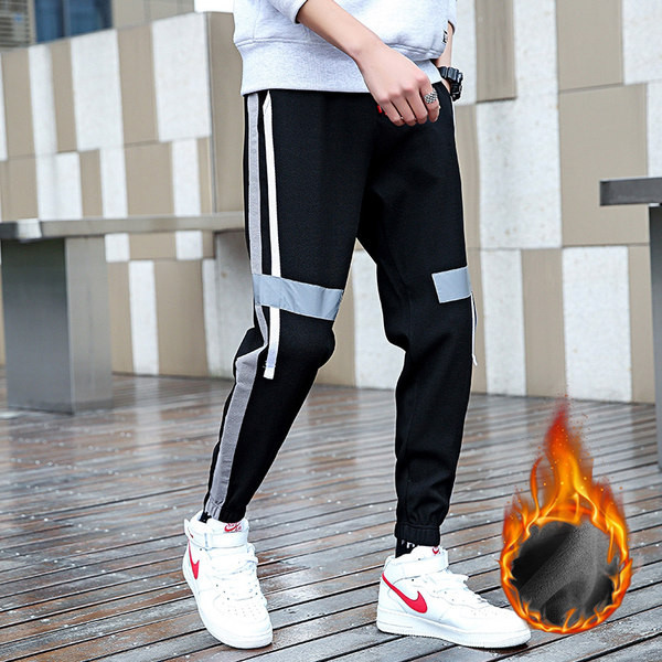 Vīriešu sporta garās bikses melnā krāsā ar apmalīti