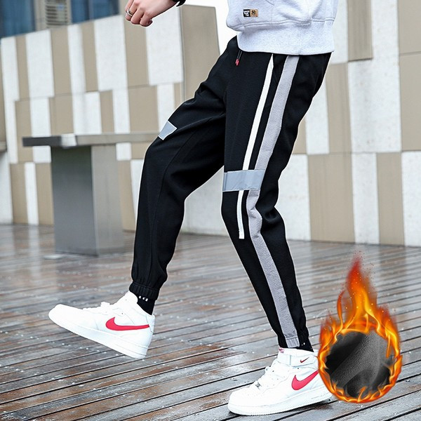 Vīriešu sporta garās bikses melnā krāsā ar apmalīti