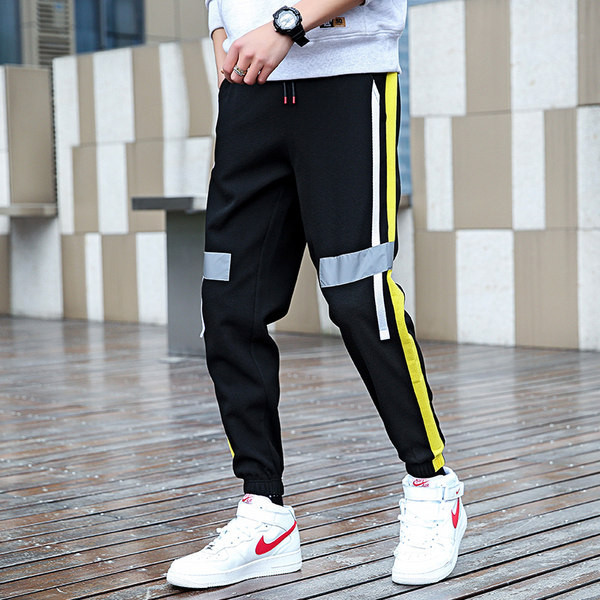 Vīriešu sporta garās bikses melnā krāsā ar apmalīti