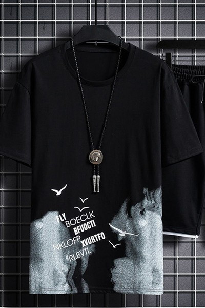 Embleemi ja lühikeste varrukatega kaheosaline meeste spordimeeskond