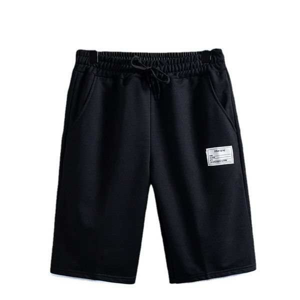 Embleemi ja lühikeste varrukatega kaheosaline meeste spordimeeskond