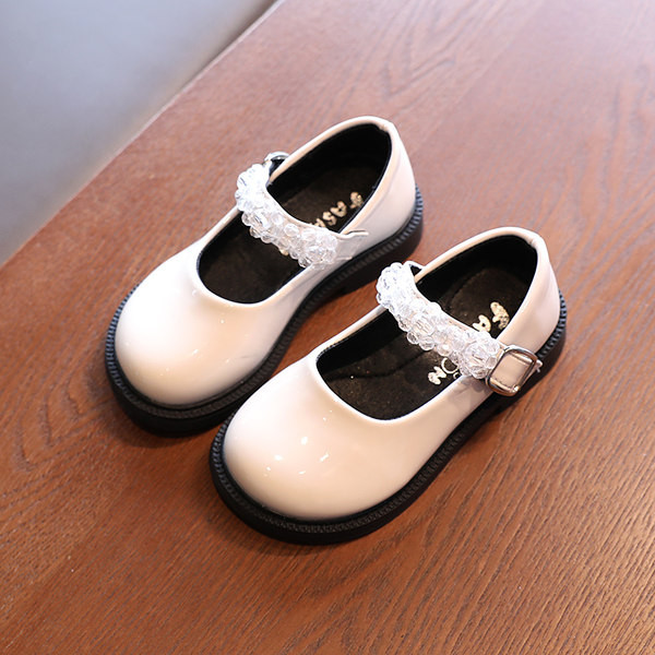 Eleganti lakādas apavi meitenei ar dekorāciju