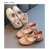 Moodsad laste nahast paelaga kingad