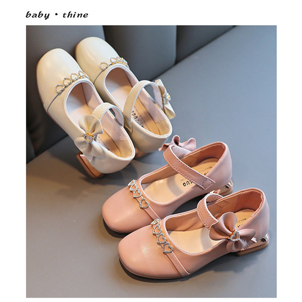 Moodsad laste nahast paelaga kingad