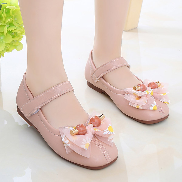 Ležerne dječje cipele s naljepnicama i ukrasom od vrpce