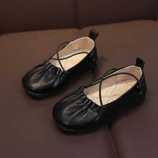Dječje kožne cipele s ravnim potplatom i križnim remenom