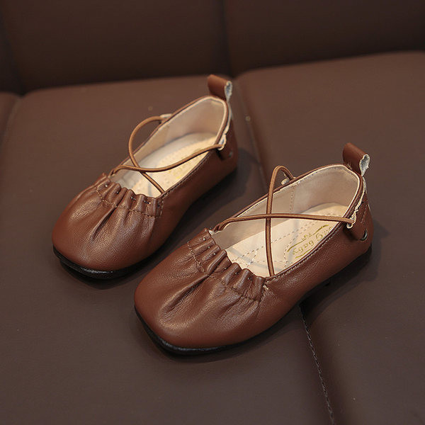Dječje kožne cipele s ravnim potplatom i križnim remenom