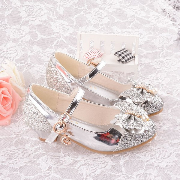 Spīdīgi bērnu apavi ar lenti un sprādzi