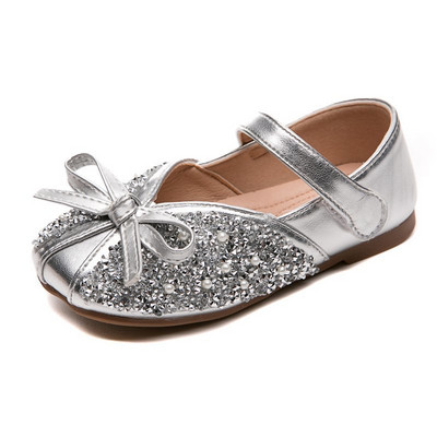 Laste läikivad paela ja litritega kingad