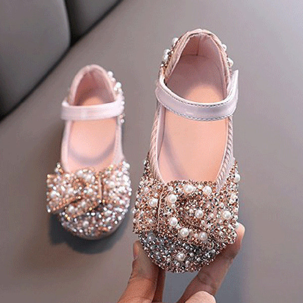 Laste säravad pärlite ja takjapaelaga kingad