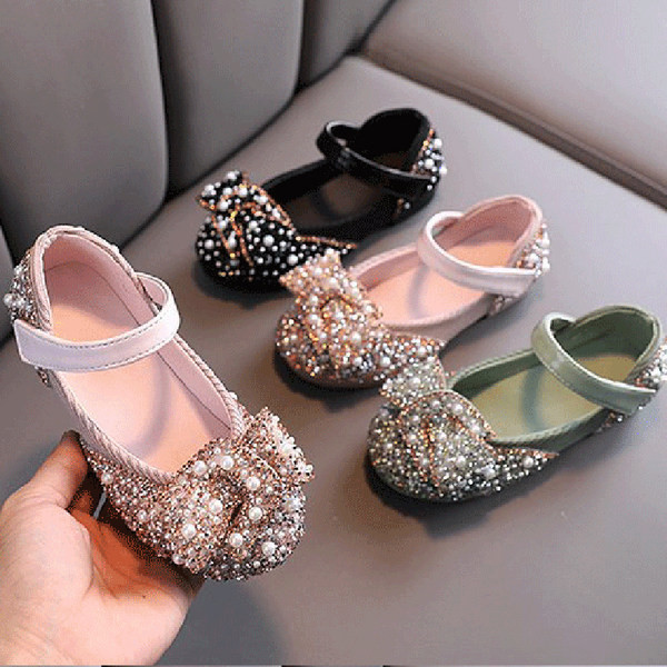 Laste säravad pärlite ja takjapaelaga kingad