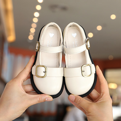 Bērnu ikdienas apavi ar sprādzi baltā un melnā krāsā