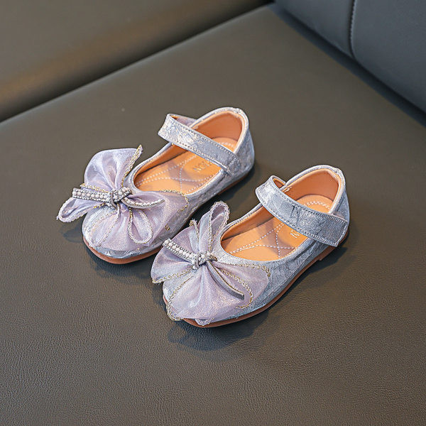 Ležerne dječje cipele s ravnim potplatom i ukrasom od vrpce