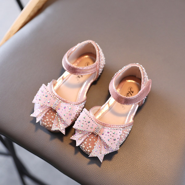 Mūsdienīgi bērnu apavi ar akmentiņiem un lentīti meitenēm