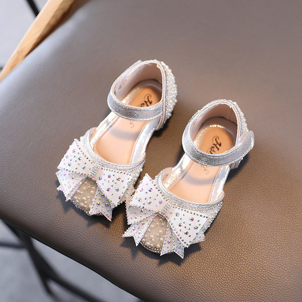 Mūsdienīgi bērnu apavi ar akmentiņiem un lentīti meitenēm