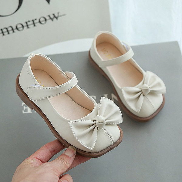 Laste kandilised takjakinnituse ja paelaga kingad