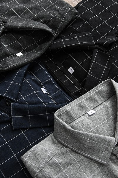 Klassikalise krae ja nööpidega ruuduline meestesärk