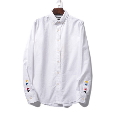 Meeste särk värvilise tikandiga varrukal